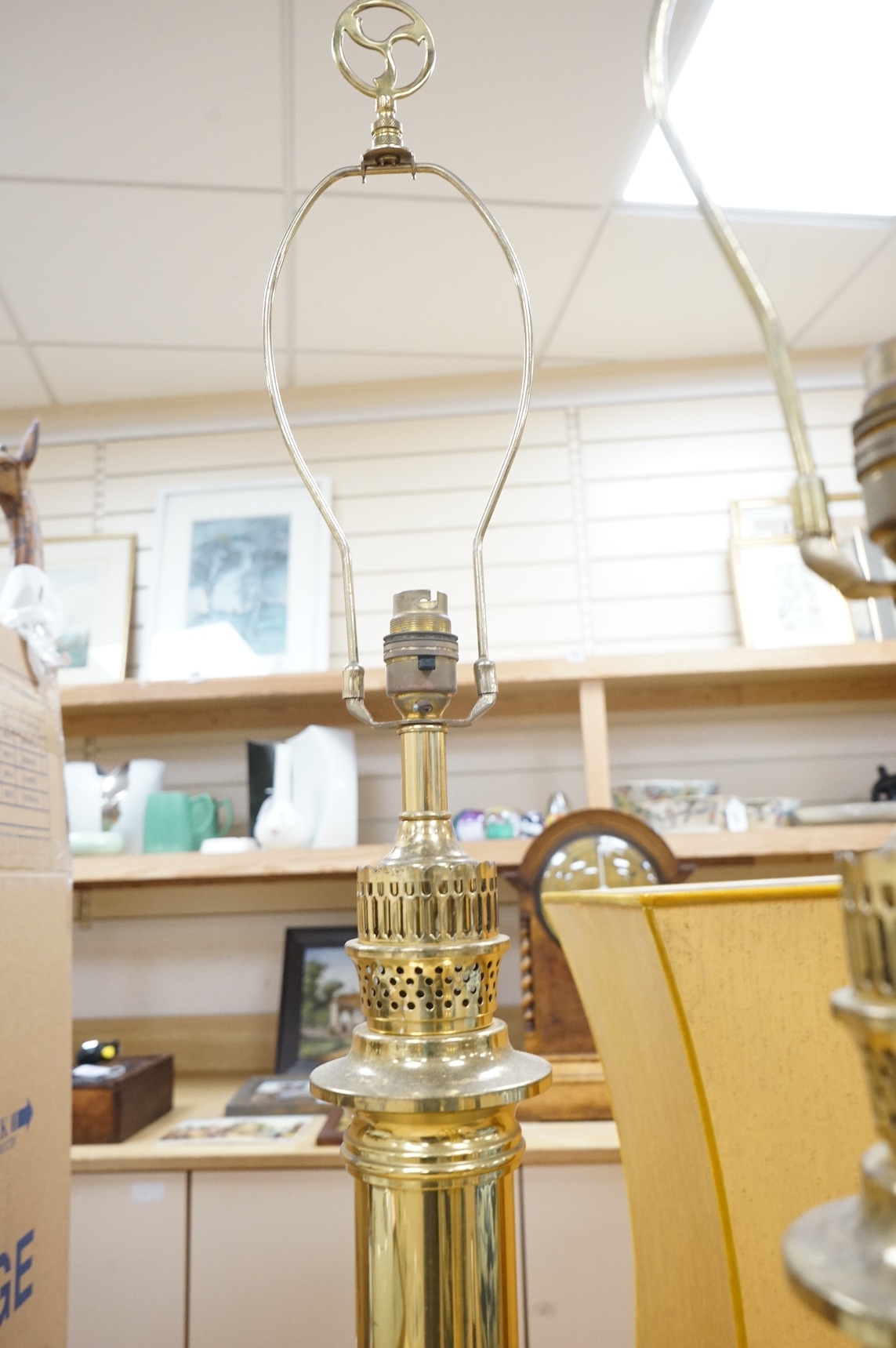 A pair of brass column table lamps, 51cm high excluding fitting